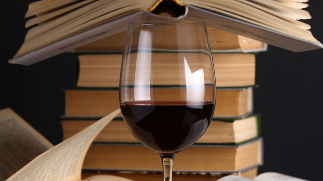 Red Wine with a stack of books