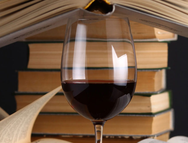 Red Wine with a stack of books