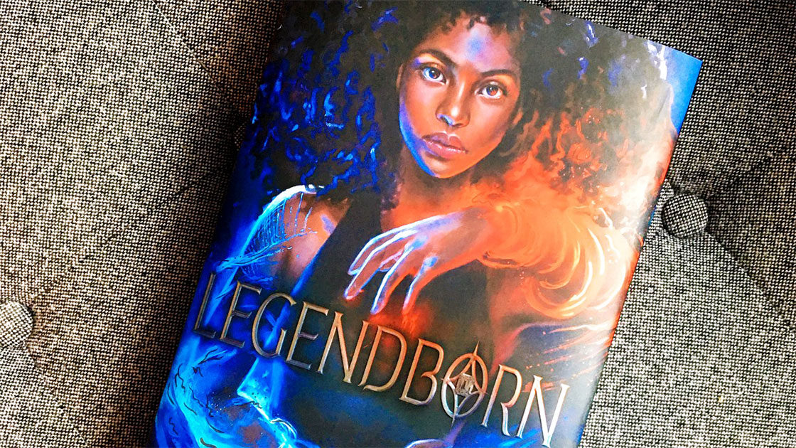 Legendborn book on a couch